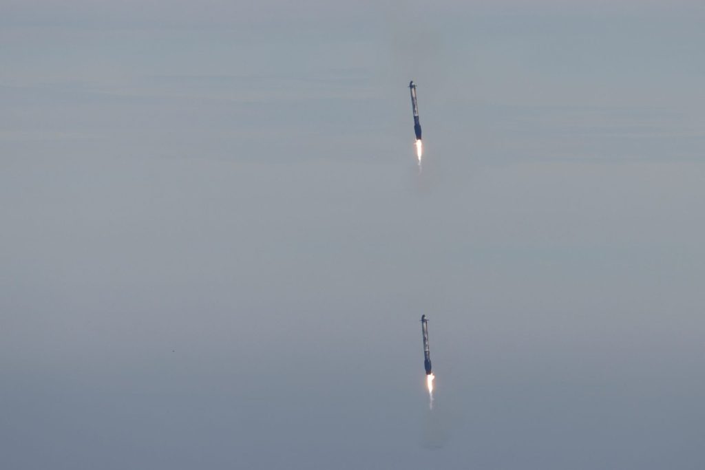 Two boosters return to the Cape Canaveral Space Force Station after launch from the nearby Kennedy Space Center after a SpaceX Falcon Heavy rocket carried the fourth and final satellite of the next-generation series of geostationary weather satellites for NASA and NOAA in Cape Canaveral, Florida, U.S. June 25, 2024. REUTERS