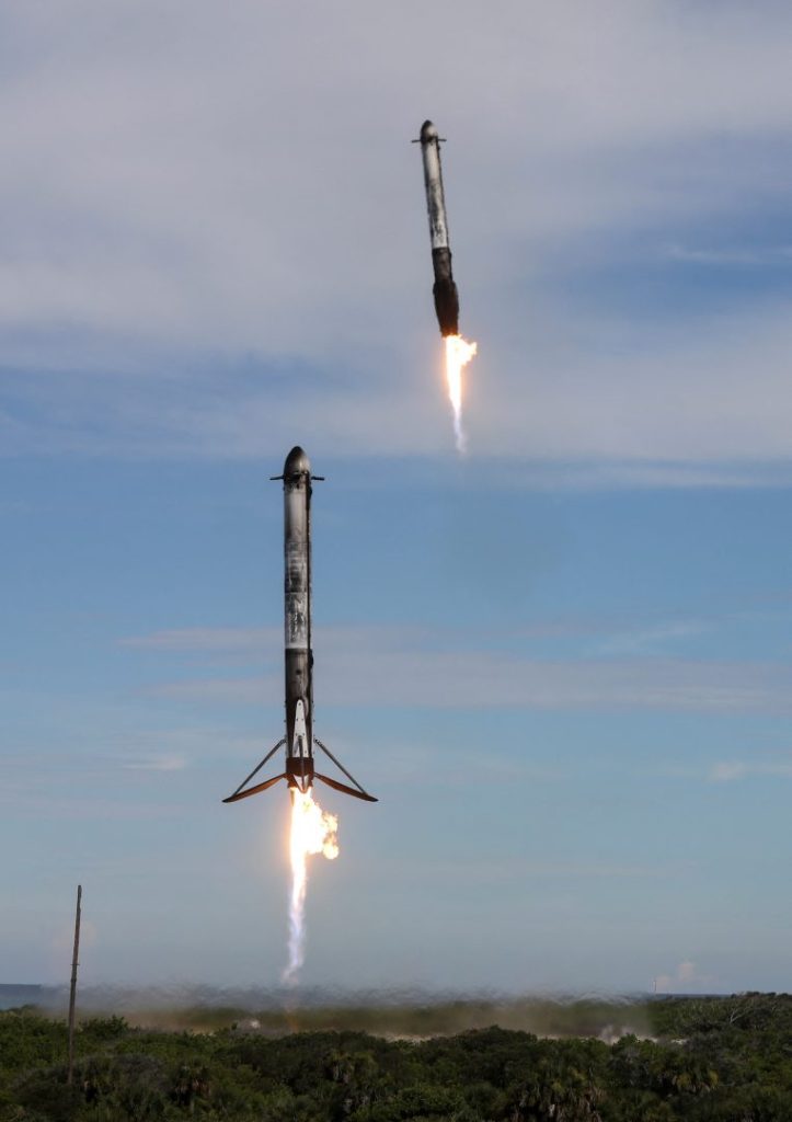 Two boosters return to the Cape Canaveral Space Force Station after launch from the nearby Kennedy Space Center after a SpaceX Falcon Heavy rocket carried the fourth and final satellite of the next-generation series of geostationary weather satellites for NASA and NOAA in Cape Canaveral, Florida, U.S. June 25, 2024. REUTERS